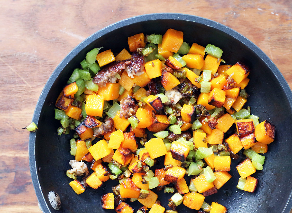 bowl of butternut squash hash with celery