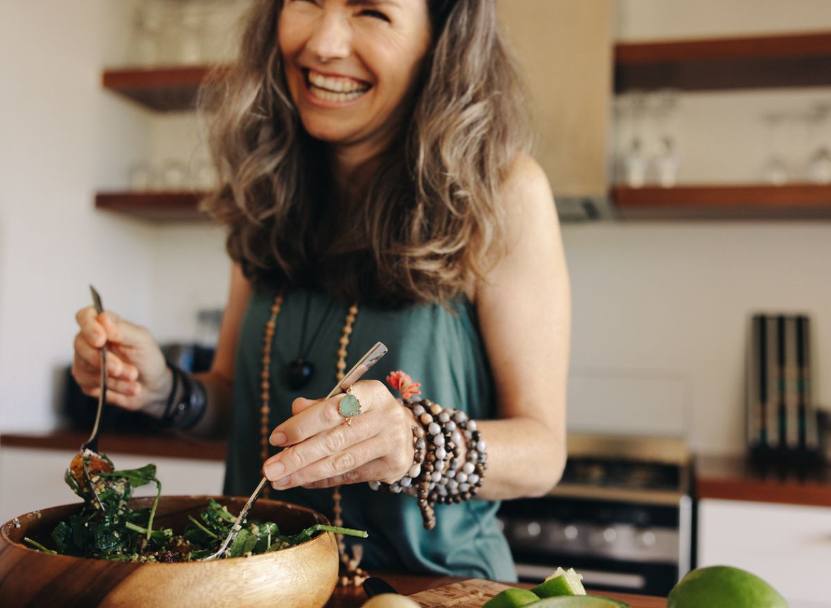 woman eating salad