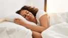 woman sleeping, concept of sleeping habit that's aging you faster